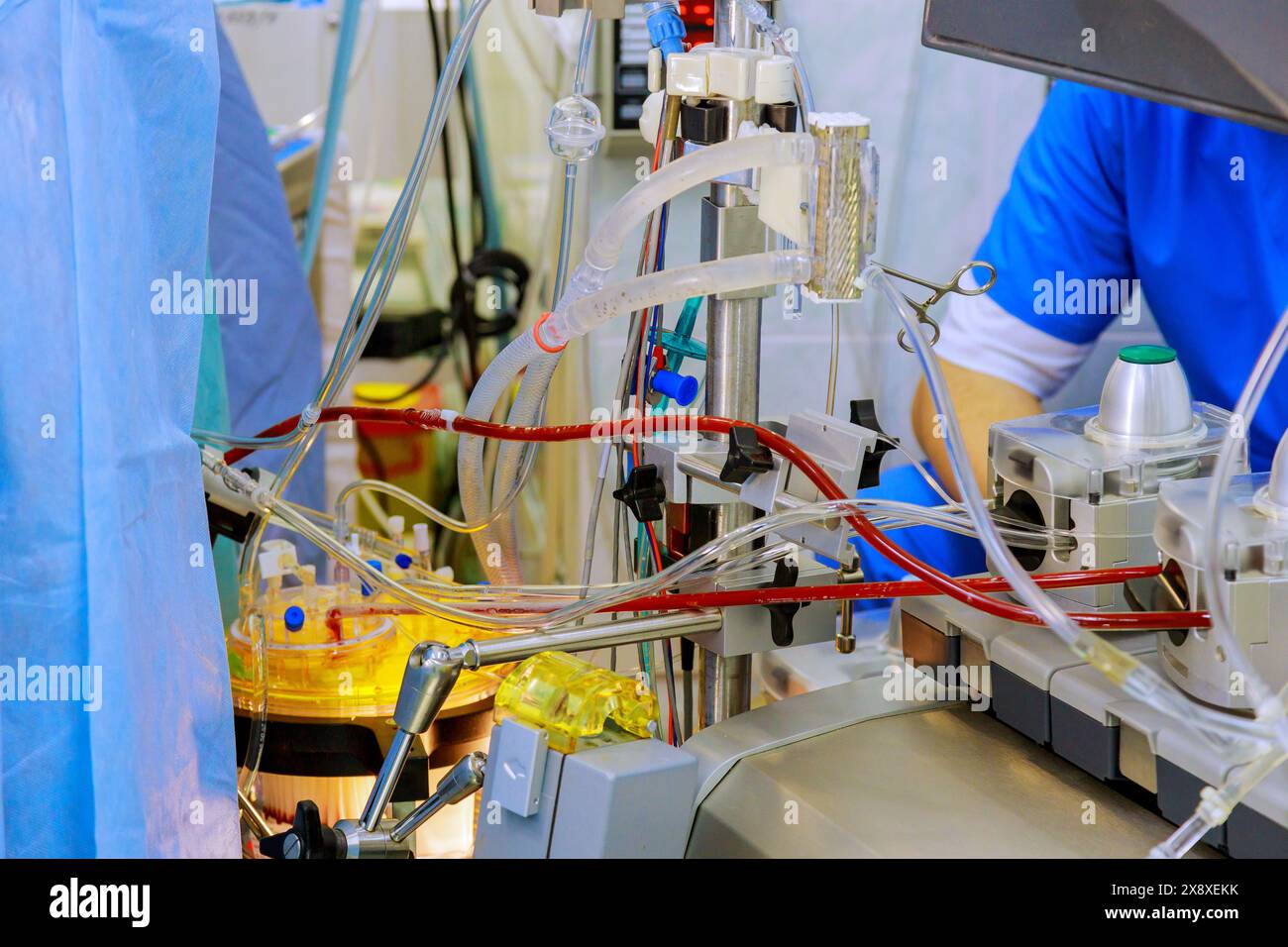 During doctor performing surgery used surgical equipment, anesthesia machine in operating room Stock Photo