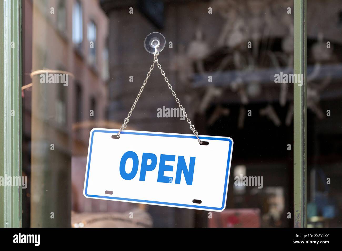 Close-up on an open sign in a window. Stock Photo