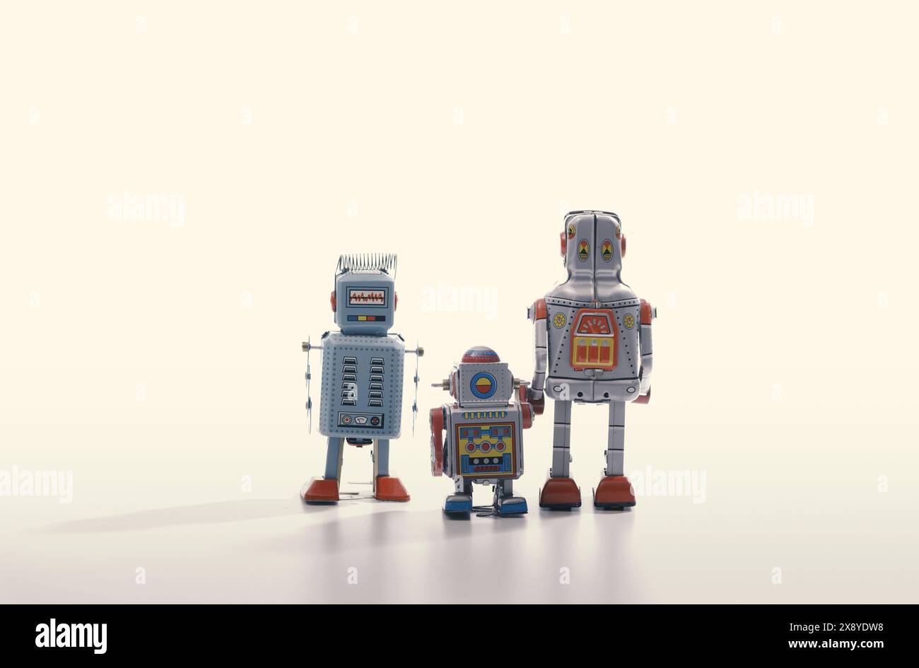 Vintage tin toy robots standing together, vintage mechanical toys and ...