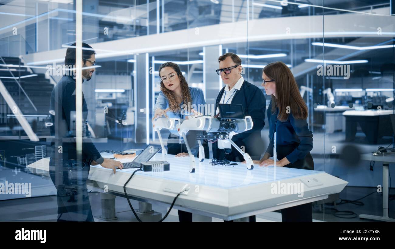 Diverse team engineers laptop tablet hi-res stock photography and ...