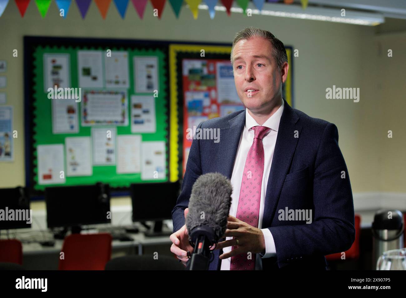 Education Minister Paul Givan during an interview announcing new school ...