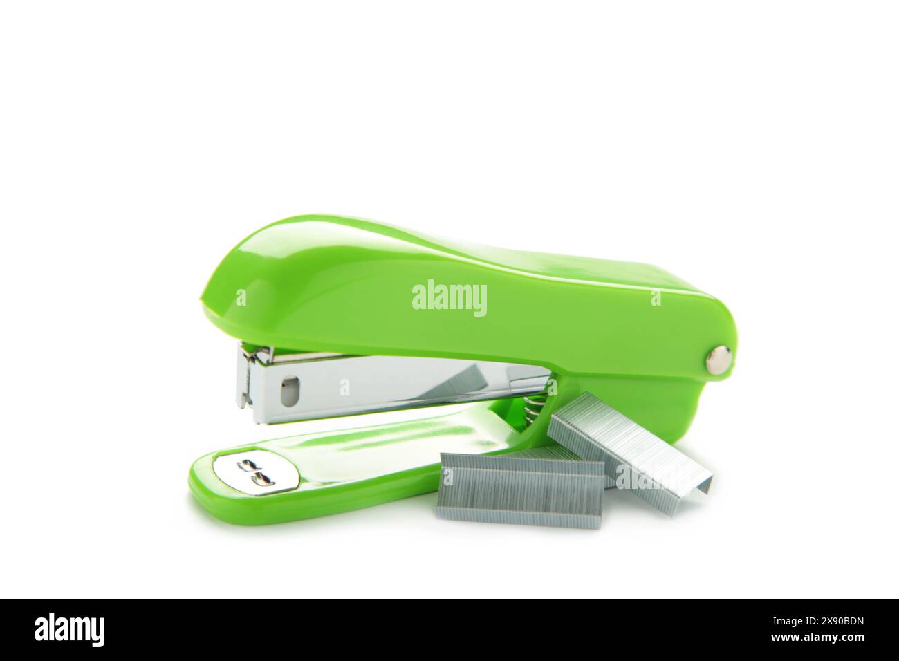 Green stapler isolated on a white background. Top view Stock Photo - Alamy