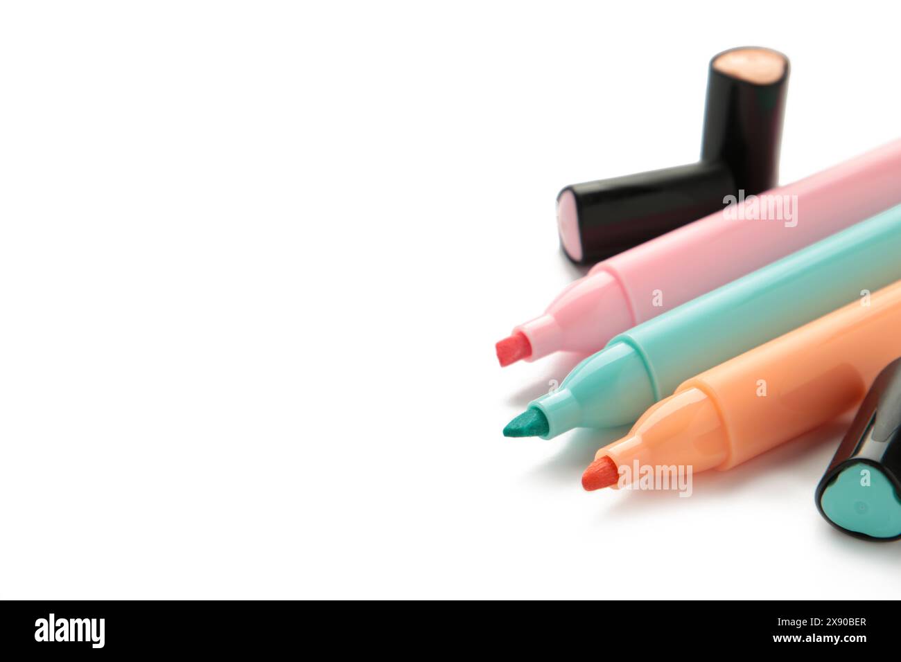 Open highlighters isolated on white background. Top view Stock Photo