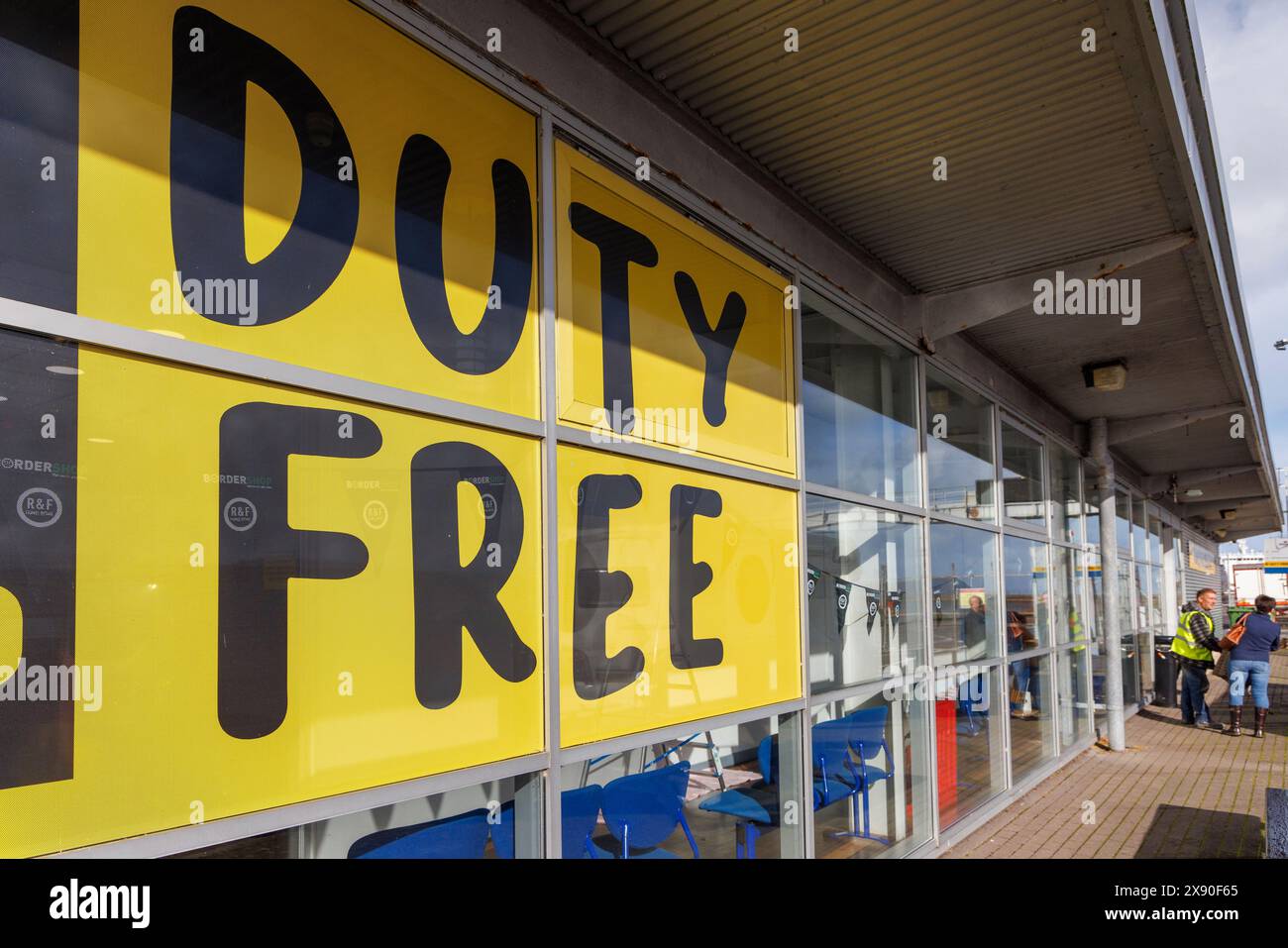 Duty free shopping sign at ferry terminal, Fishguard, Wales, UK Stock Photo