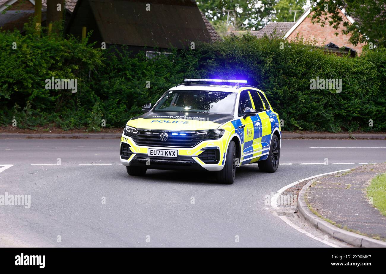Blue and yellow police car hi-res stock photography and images - Alamy