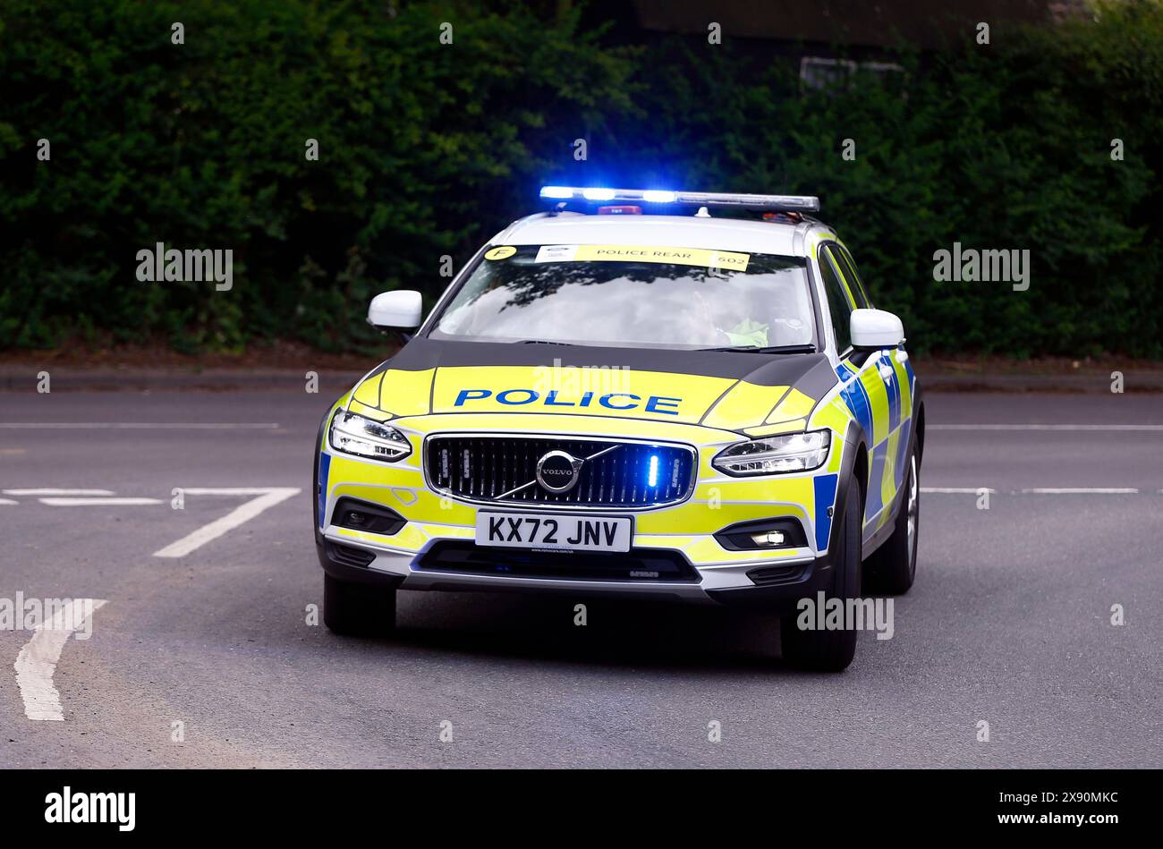 Blue and yellow police car hi-res stock photography and images - Alamy