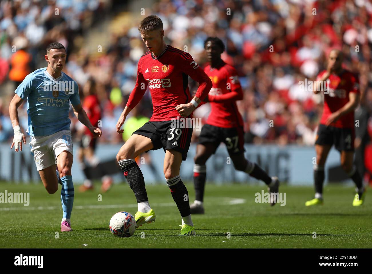 Scott McTominay of Manchester United and Phil Foden of Manchester City
