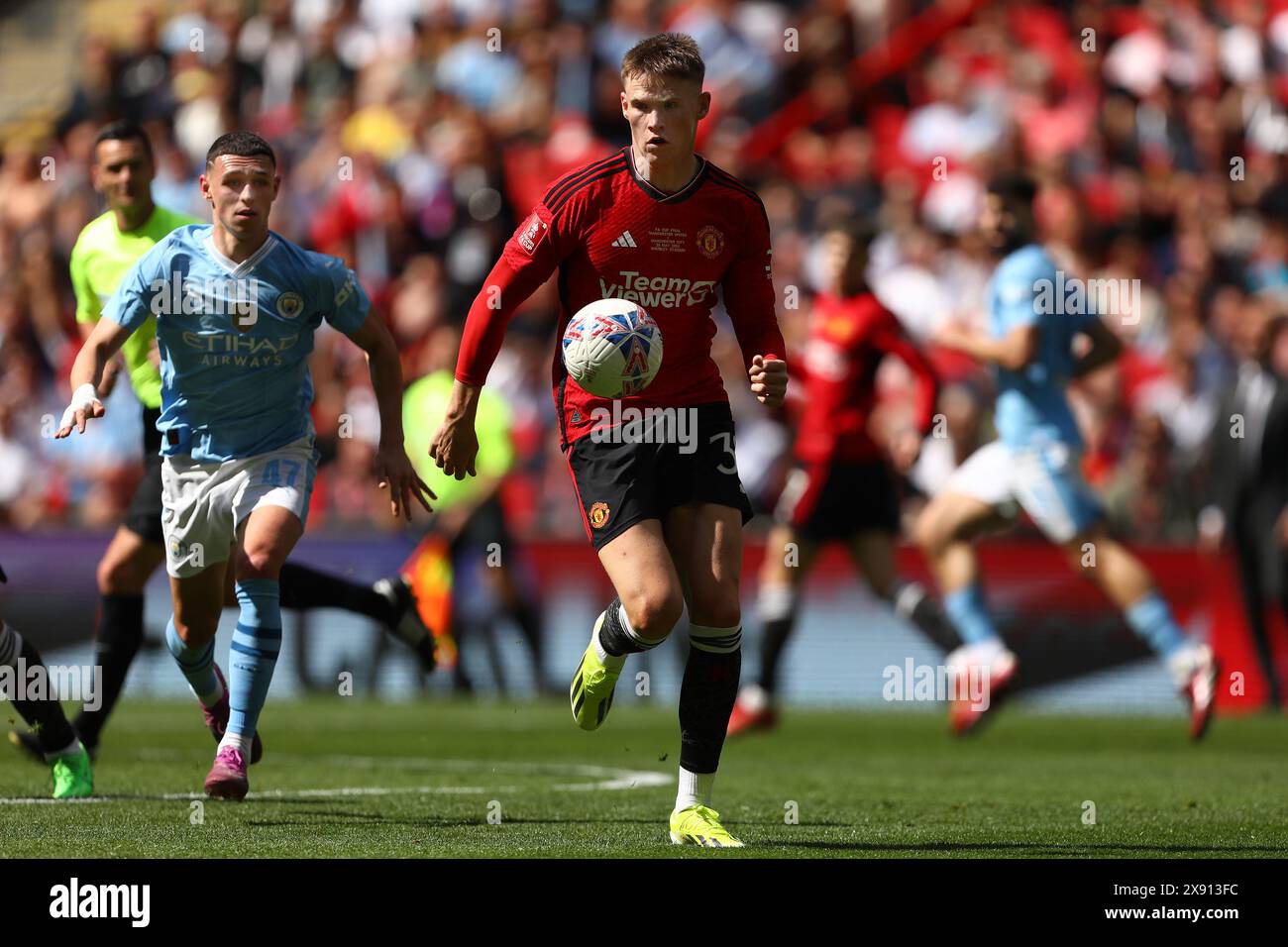 Scott McTominay of Manchester United and Phil Foden of Manchester City