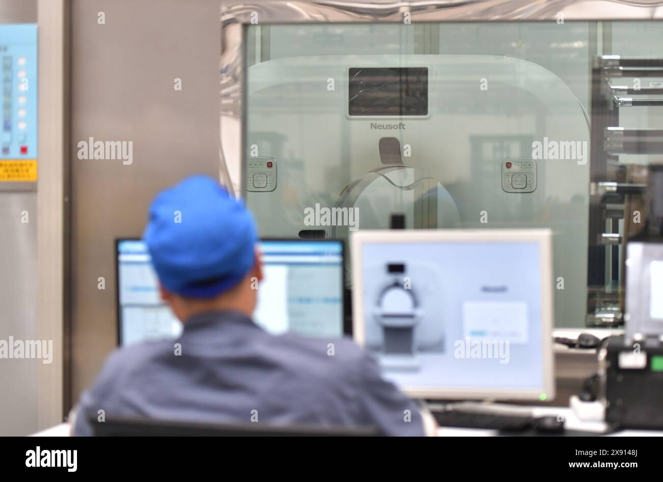 (240528) -- SHENYANG, May 28, 2024 (Xinhua) -- A worker checks a CT machine at Neusoft Medical in Shenyang, northeast China's Liaoning Province, May 22, 2024. In recent years, Shenyang has created an environment to better develop biomedicine and medical equipment industries, laying a foundation to form medical industrial clusters.    In 2023, Shenyang's biomedical and medical equipment industry achieved a total industrial output value of 28.16 billion yuan (about 3.89 billion U.S. dollars) with a year-on-year increase of 5.4%. And three national technology centers have been cultivated.     In Stock Photo