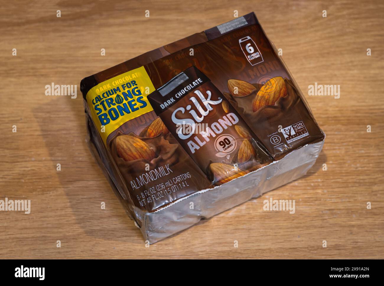 Silk Shelf-Stable Dark Chocolate Almond Milk Singles 6 pack on wooden background. Stock Photo