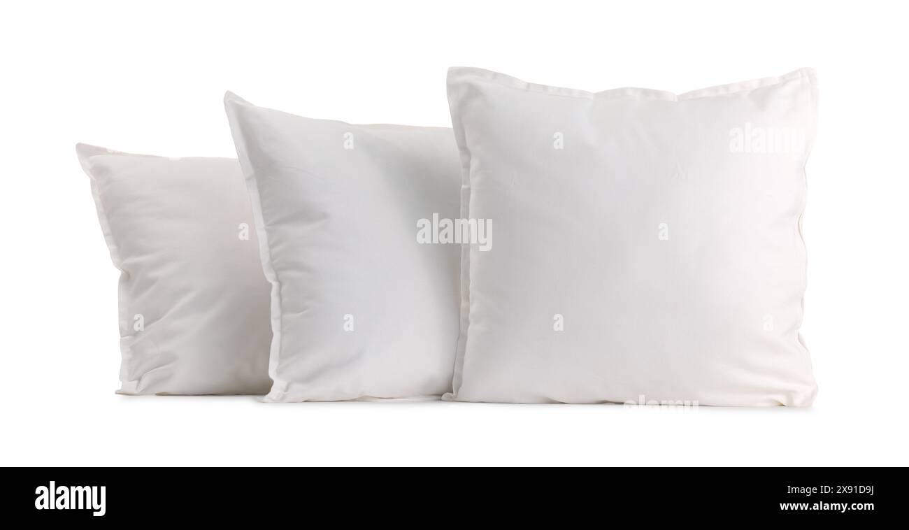 Many new soft pillows isolated on white Stock Photo