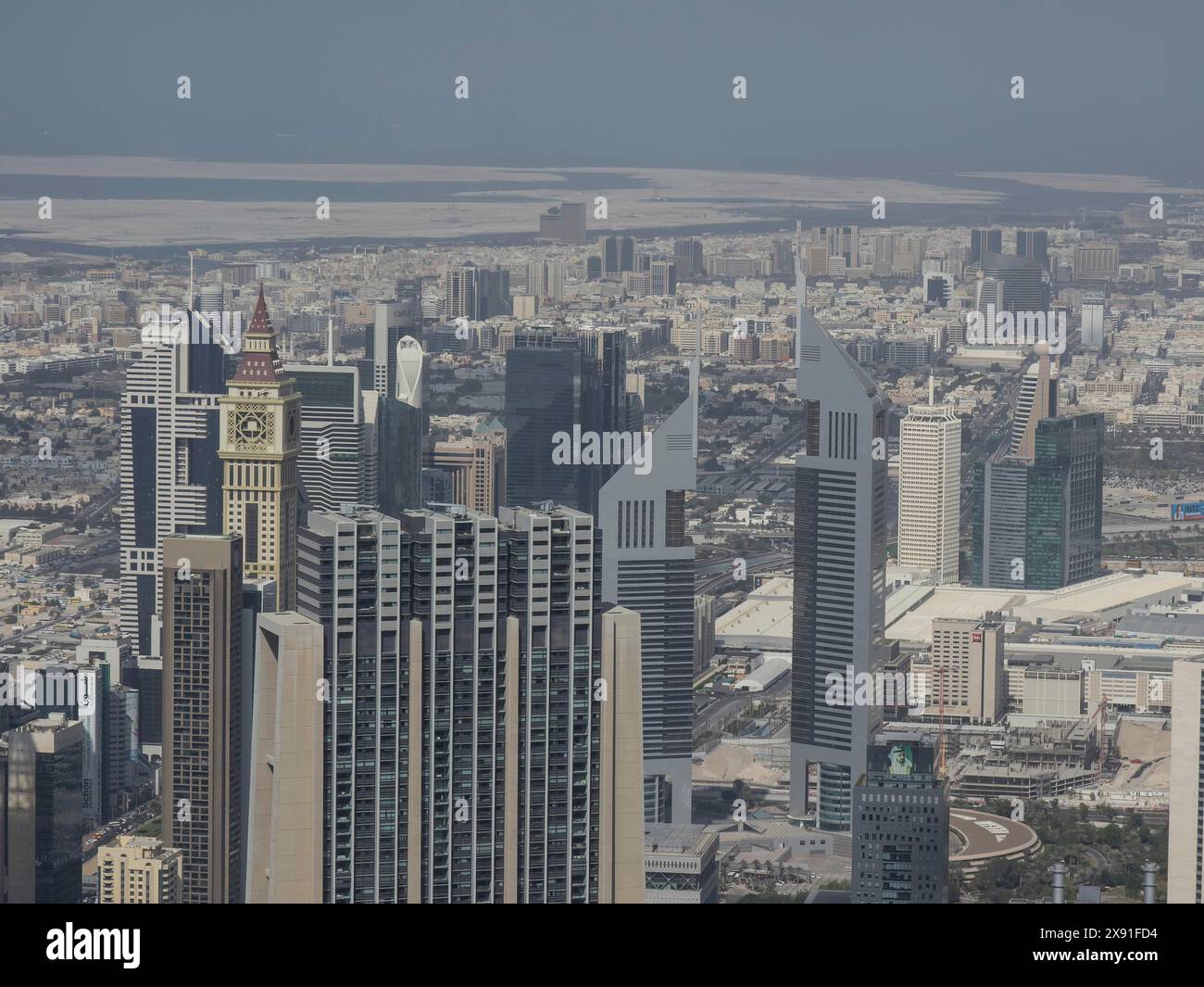 View of a city with modern skyscrapers and high-rise buildings under a ...
