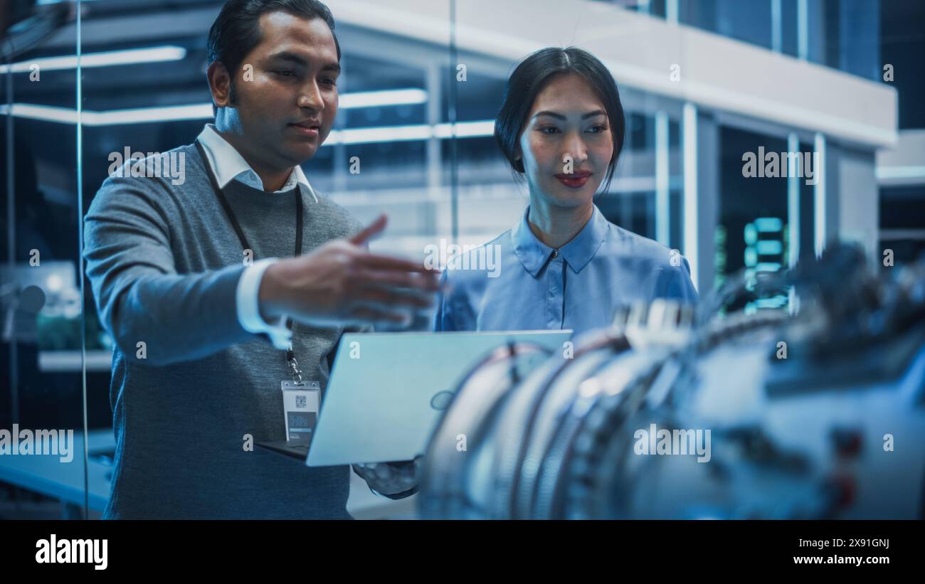 Diverse team engineers laptop tablet hi-res stock photography and ...