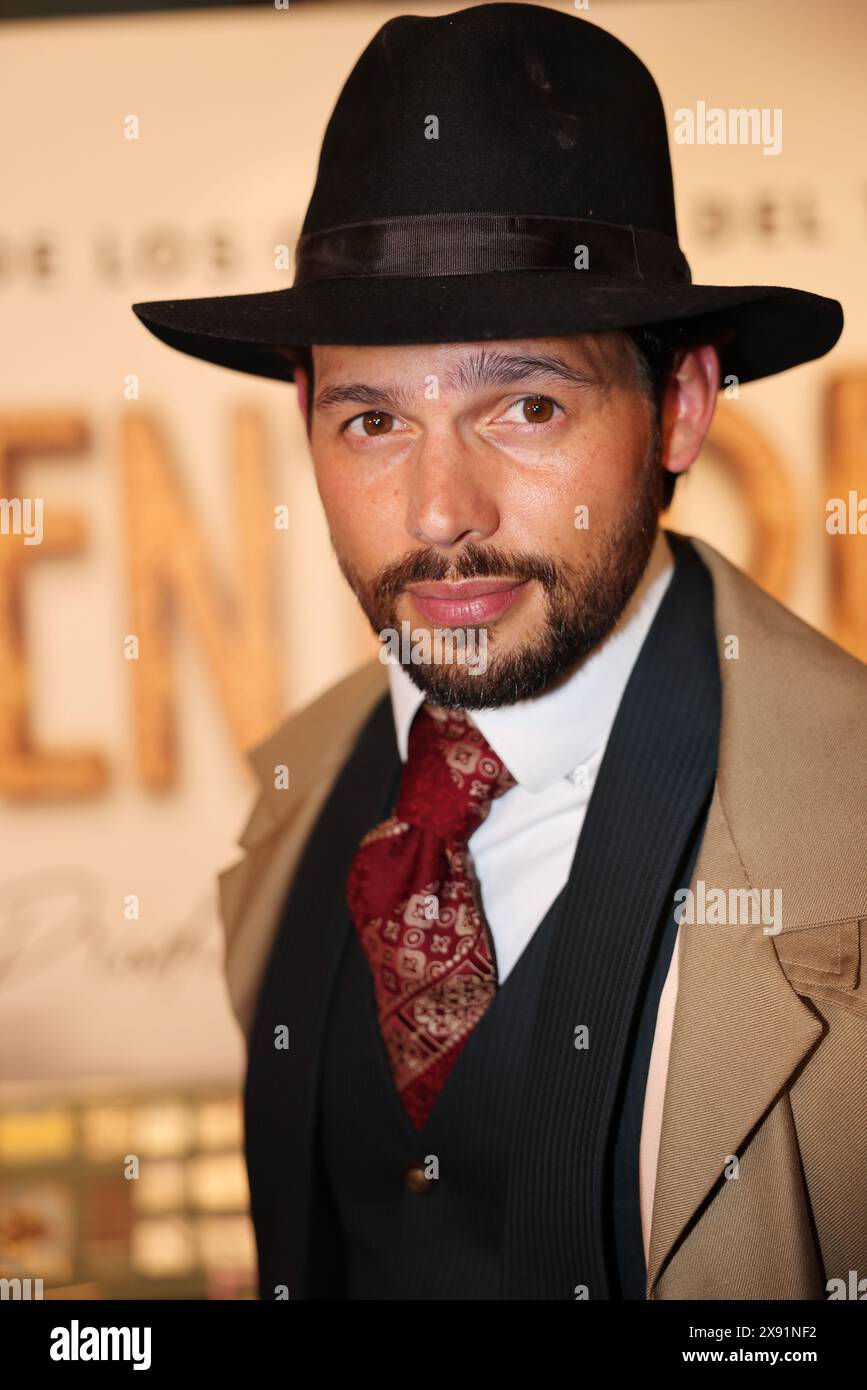 Emmanuel Palomares is posing backstage after the rehearsal of the