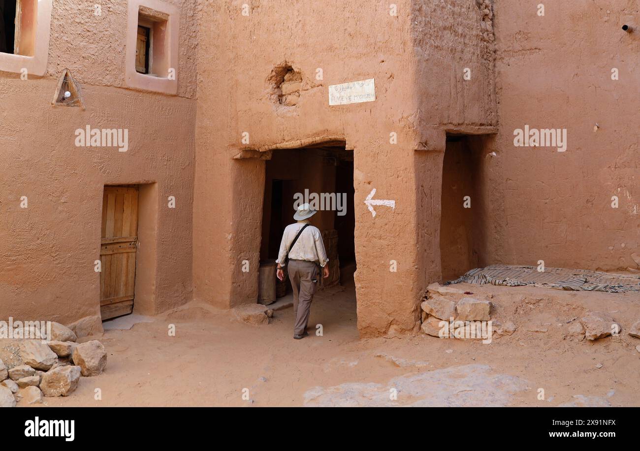 Entrance to an ancient fortified mudbrick village at Taghit in Algeria Stock Photo
