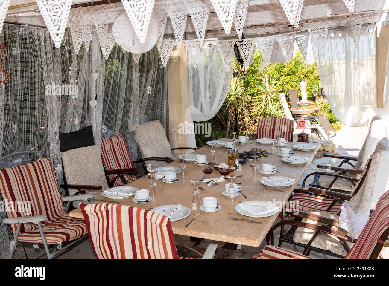 Table set out for a party Stock Photo