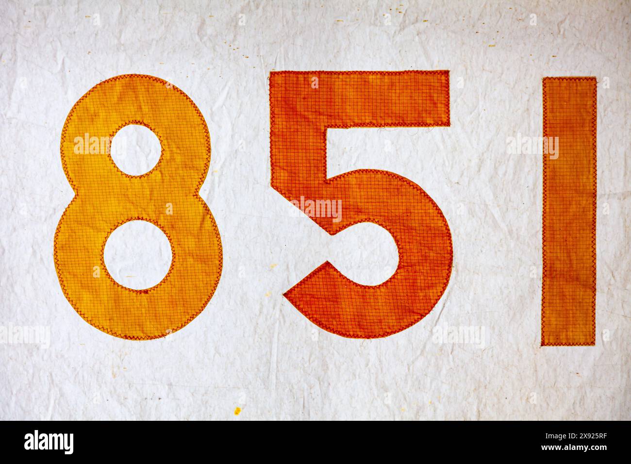 Identification numbers stitched on to a canvas sail at the Britannia Shipyard site in Steveston British Columbia Canada Stock Photo