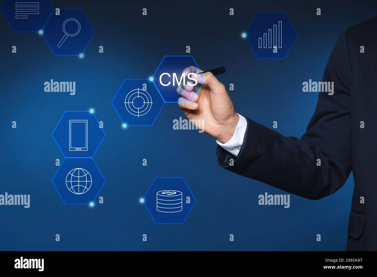 CMS. Man using virtual screen, closeup. Scheme with icons on blue background Stock Photo