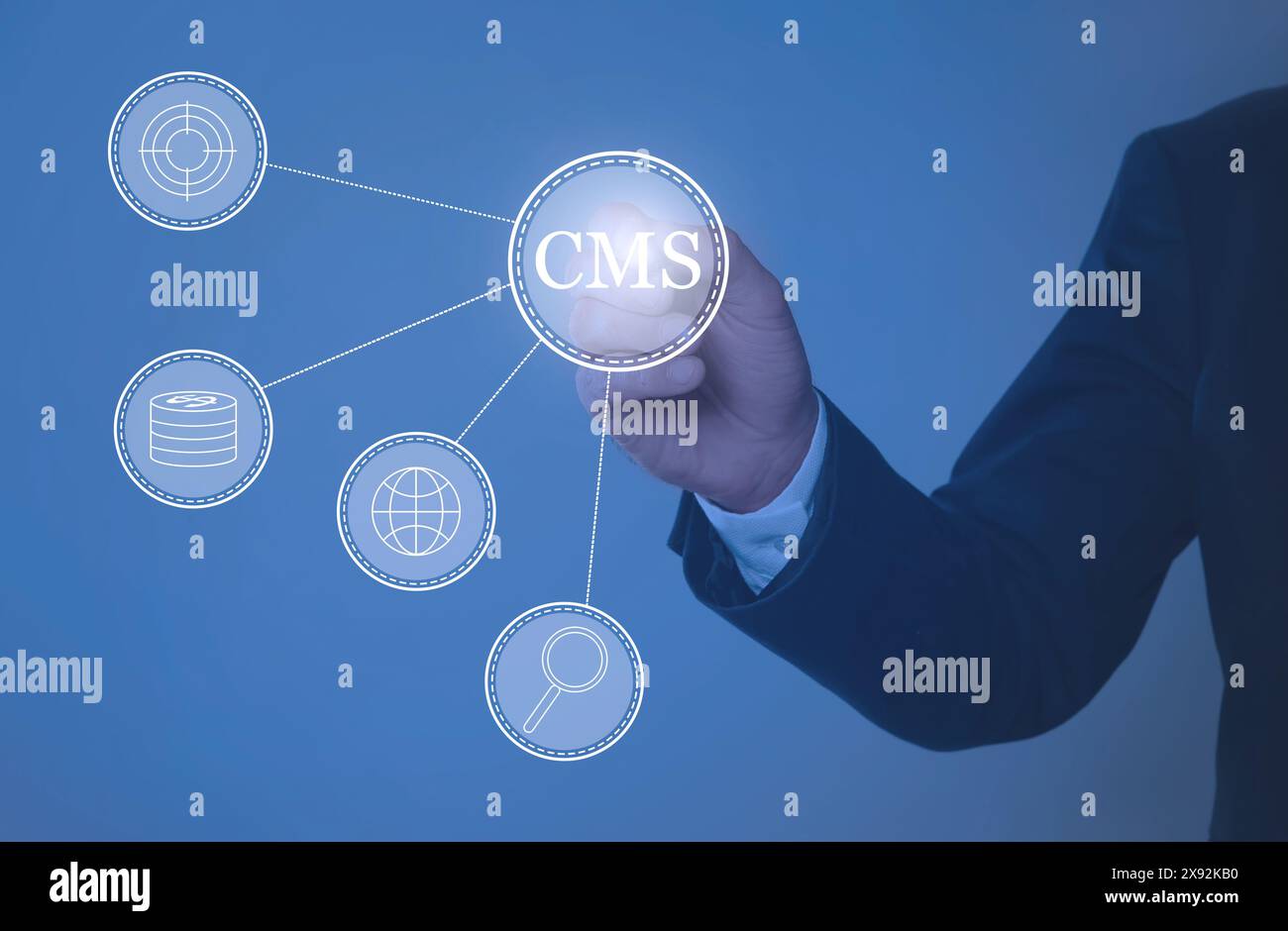 CMS. Man using virtual screen, closeup. Scheme with icons on blue background Stock Photo
