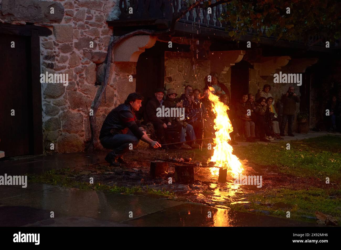 Gathering of onlookers observes hi-res stock photography and images - Alamy