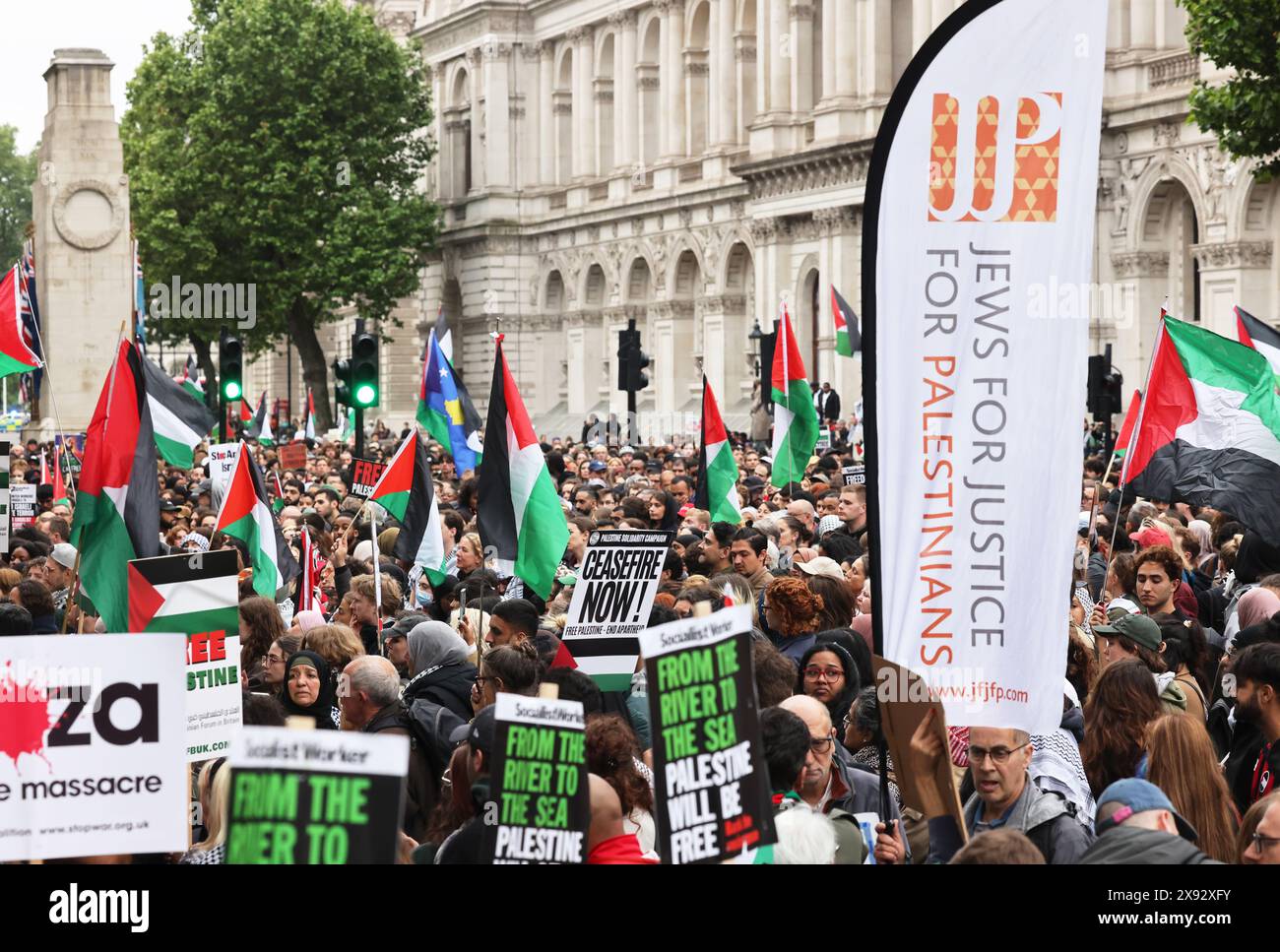 London, UK 28th, May 2024. Tens of thousands gathered outside Downing Street this evening to protest against Israel's assault on Rafah which resulted in Palestinian civilians being burnt alive in their tents, described by Israeli PM Netanyahu as 'a tragic mishap', to call for an immediate ceasefire & to condemn Rishi Sunak and Keir Starmer and their parties with the upcoming election. The protest resulted in Whitehall being closed to traffic & ended with a sit in outside Downing Street. Credit : Monica Wells/Alamy Live News Stock Photo