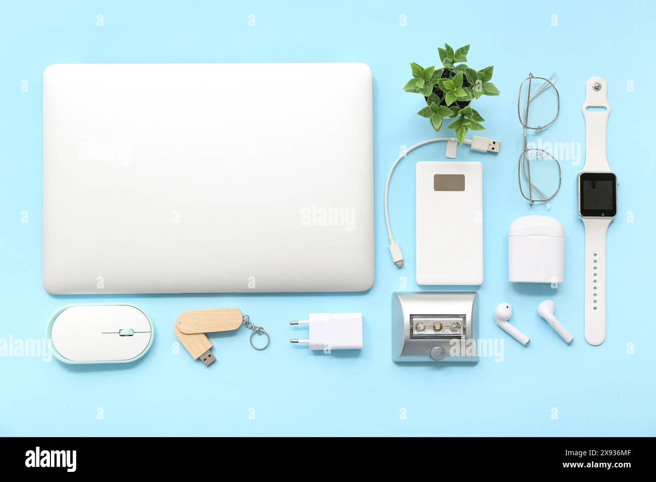 Composition with different modern gadgets on color background Stock Photo