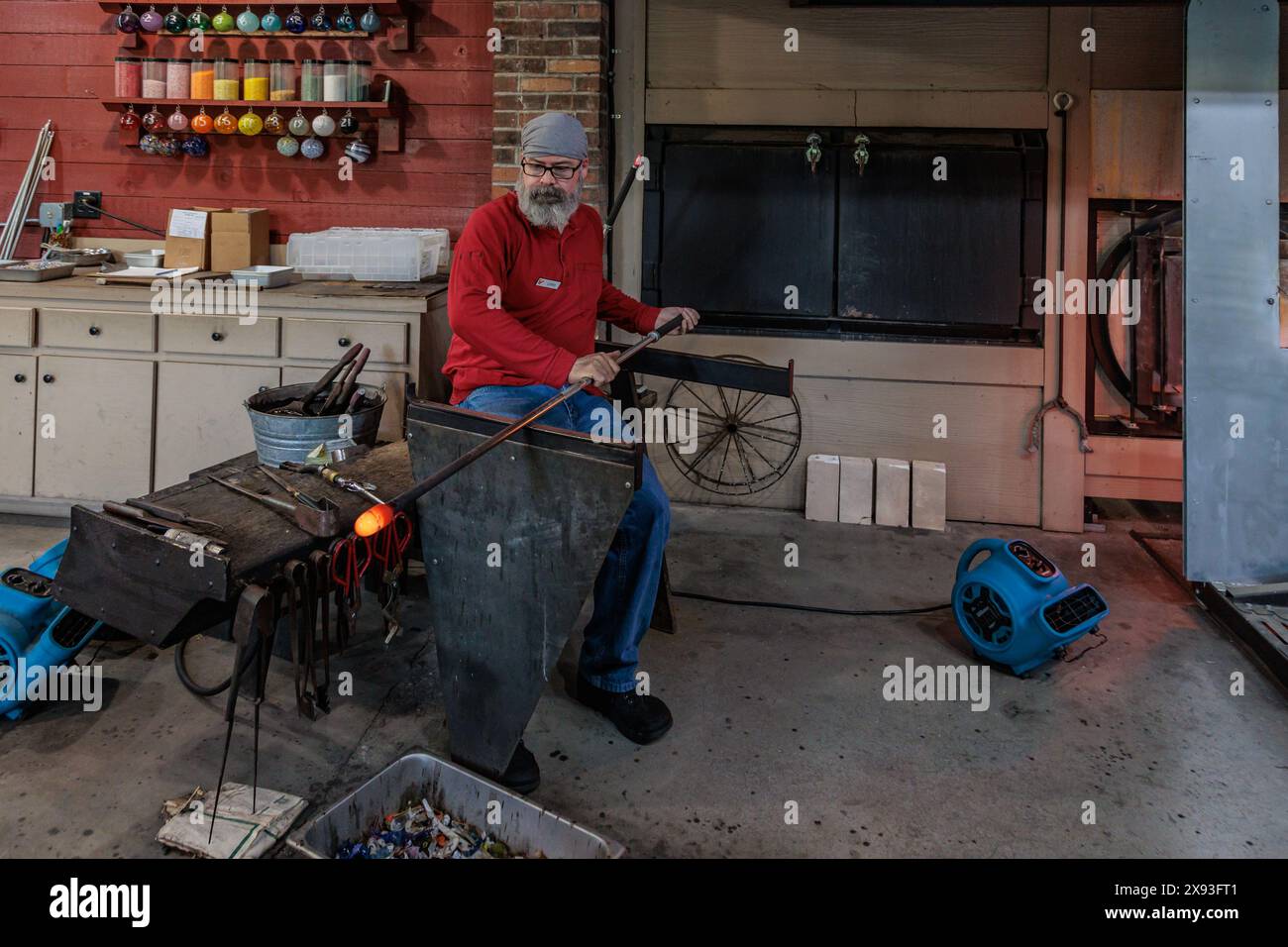 Glass blower demonstrates the art of blowing glass at the Dollywood
