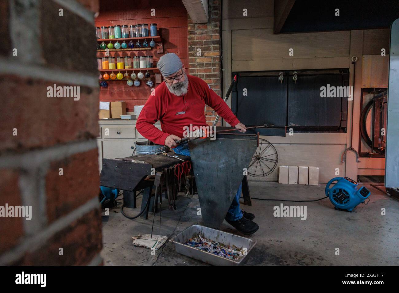 Glass blower demonstrates the art of blowing glass at the Dollywood
