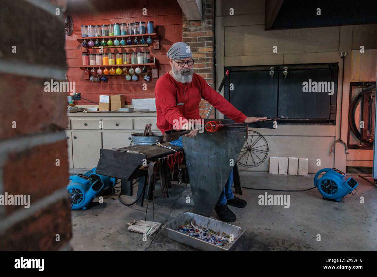 Glass blower demonstrates the art of blowing glass at the Dollywood