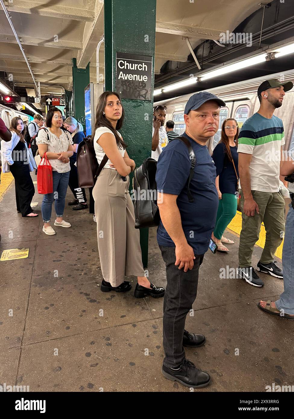 New York City commuters waiting for their train Stock Photo - Alamy