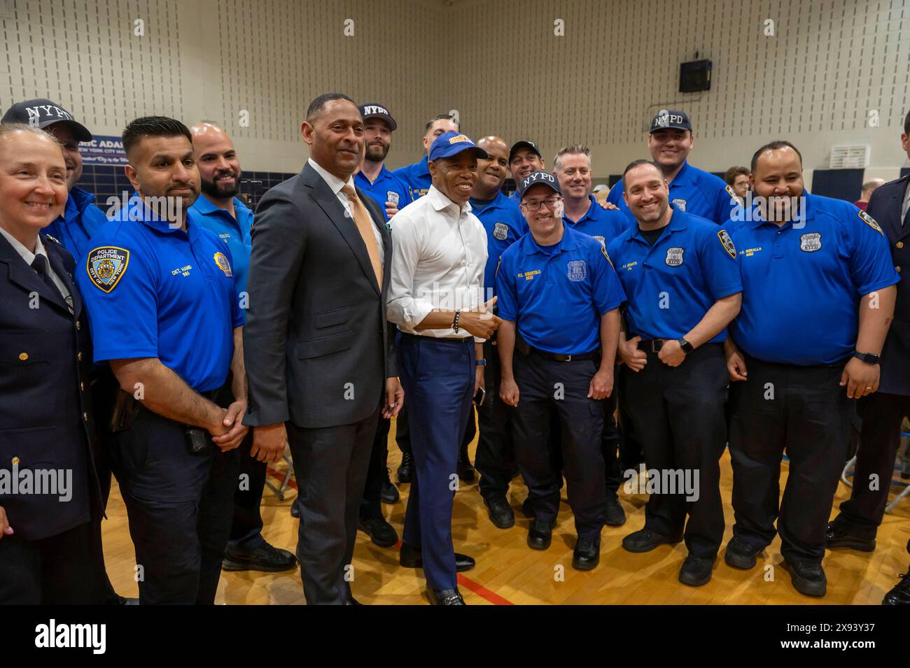 New York, United States. 28th May, 2024. New York City Mayor Eric Adams (C) poses with NYPD Police Officers at Frank Sinatra School of the Arts High School, Astoria on May 28, 2024 in the Queens Borough of New York City. Credit: SOPA Images Limited/Alamy Live News Stock Photo