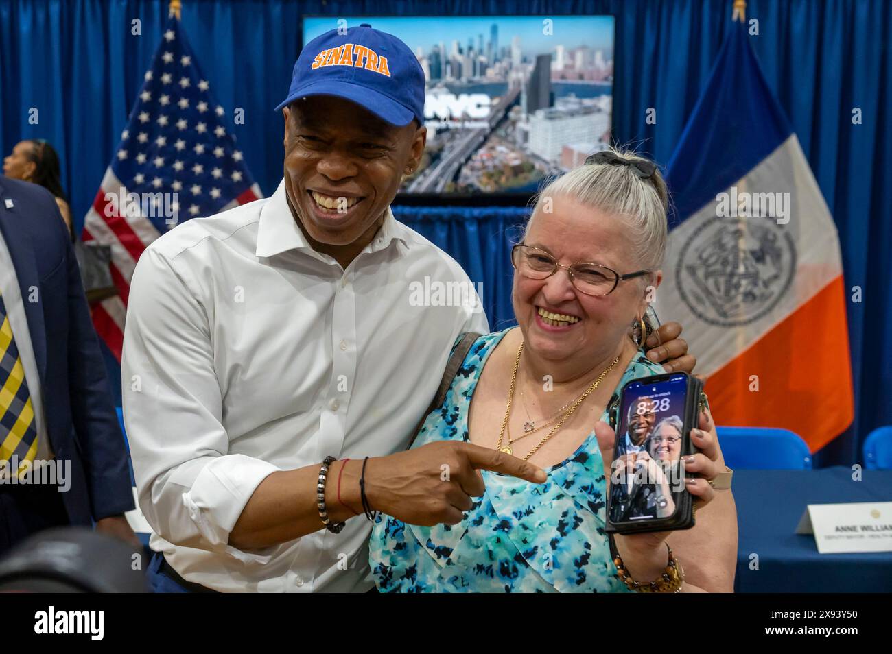 New York, United States. 28th May, 2024. New York City Mayor Eric Adams poses with a member of the audience at Frank Sinatra School of the Arts High School, Astoria on May 28, 2024 in the Queens Borough of New York City. Credit: SOPA Images Limited/Alamy Live News Stock Photo