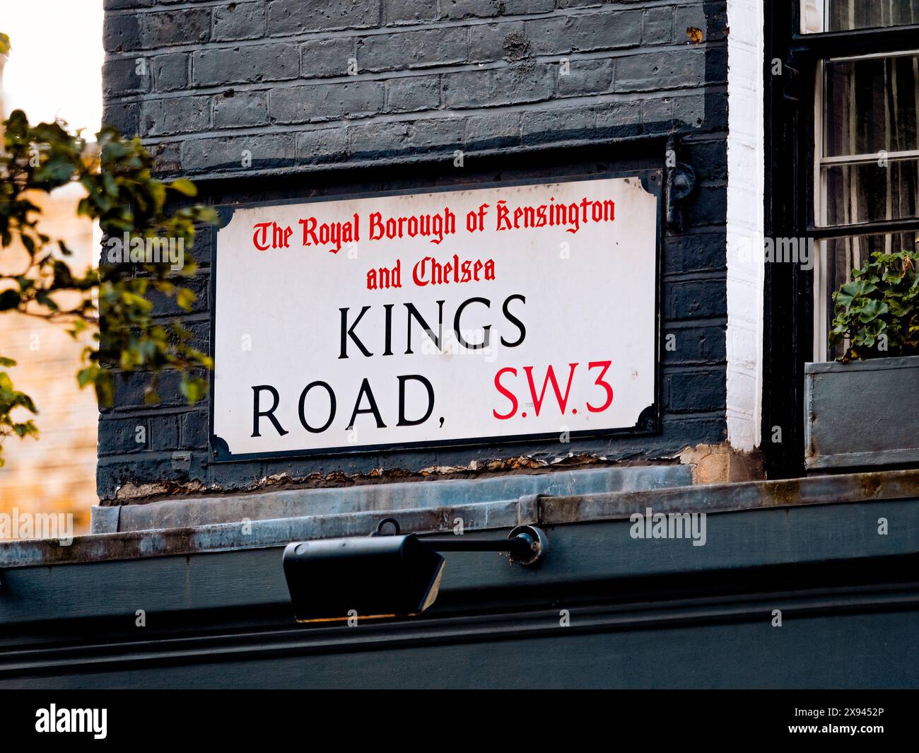 King's Road Street Sign, Fashionable in the 1960s with its many clothes shops, London, England Stock Photo