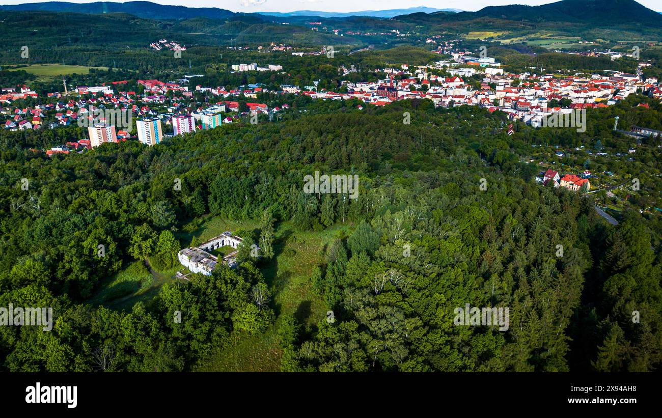 Aerial View of City Surrounded by Trees Stock Photo - Alamy