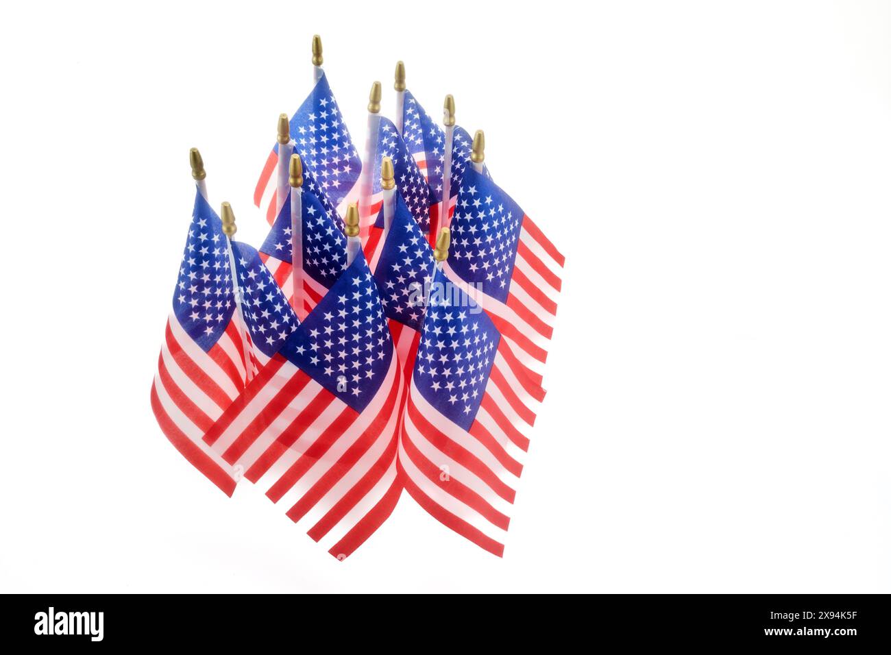 Memorial or America independence day. Row of American Flags on White Background Stock Photo