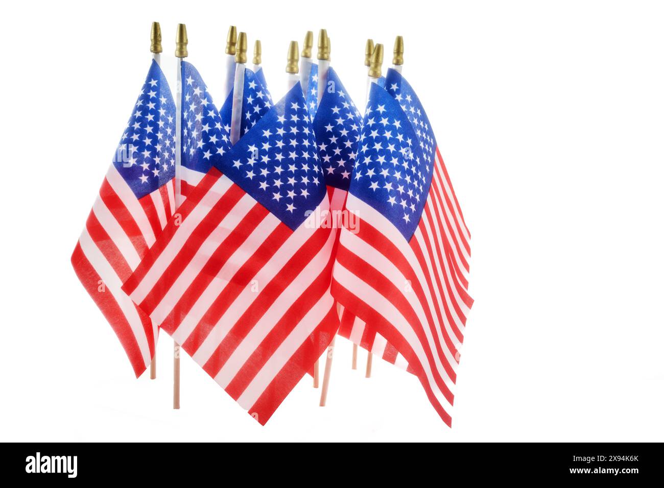 Memorial or America independence day. Row of American Flags on White Background Stock Photo