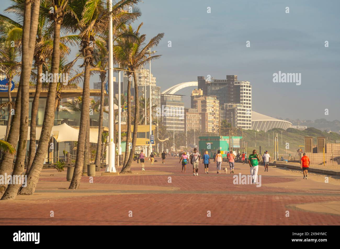 View of promenade and Moses Mabhida Stadium in background, Durban, KwaZulu-Natal Province, South Africa, Africa Stock Photo