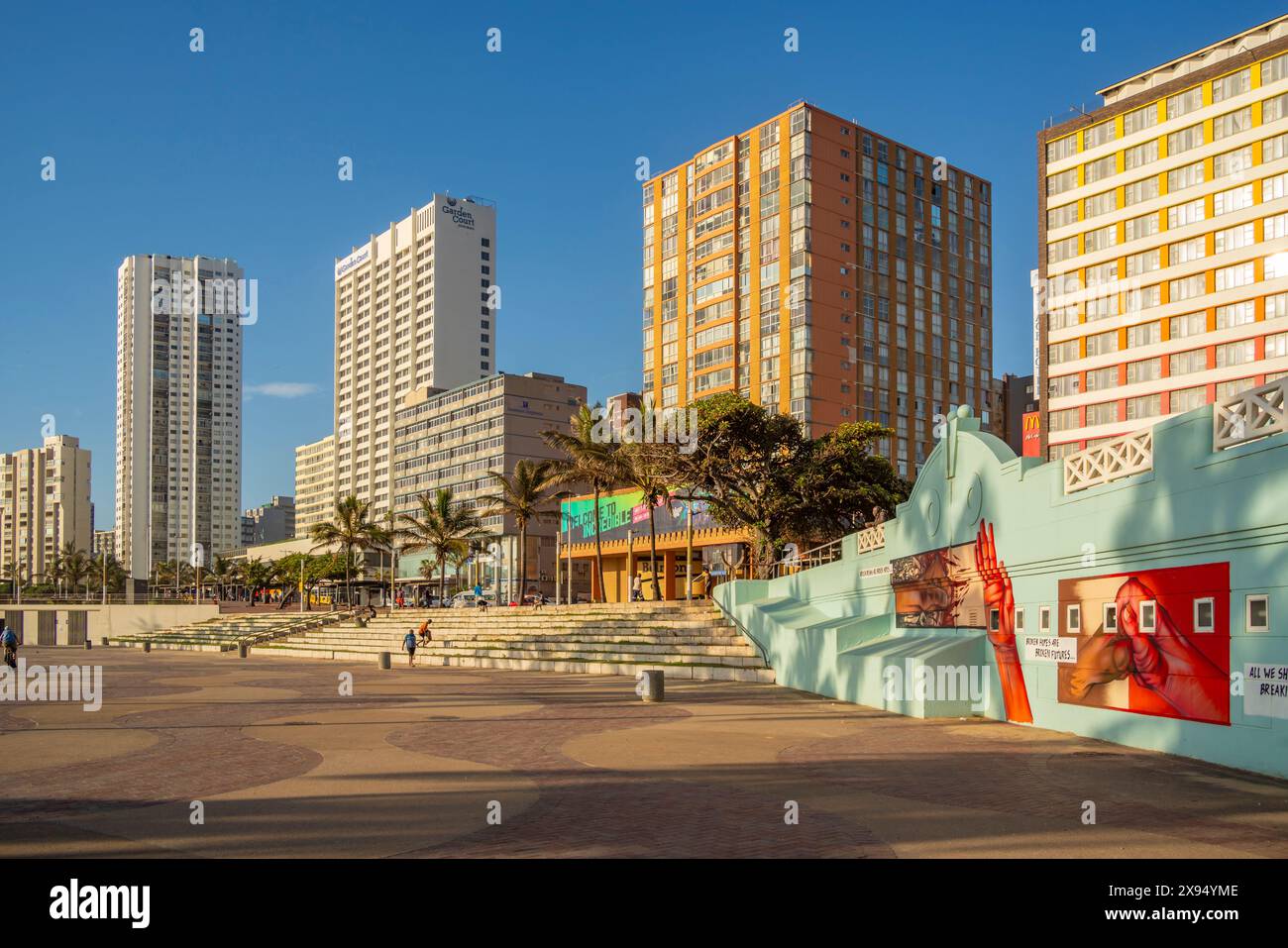 View of promenade, colourful wall art and hotels, Durban, KwaZuluNatal