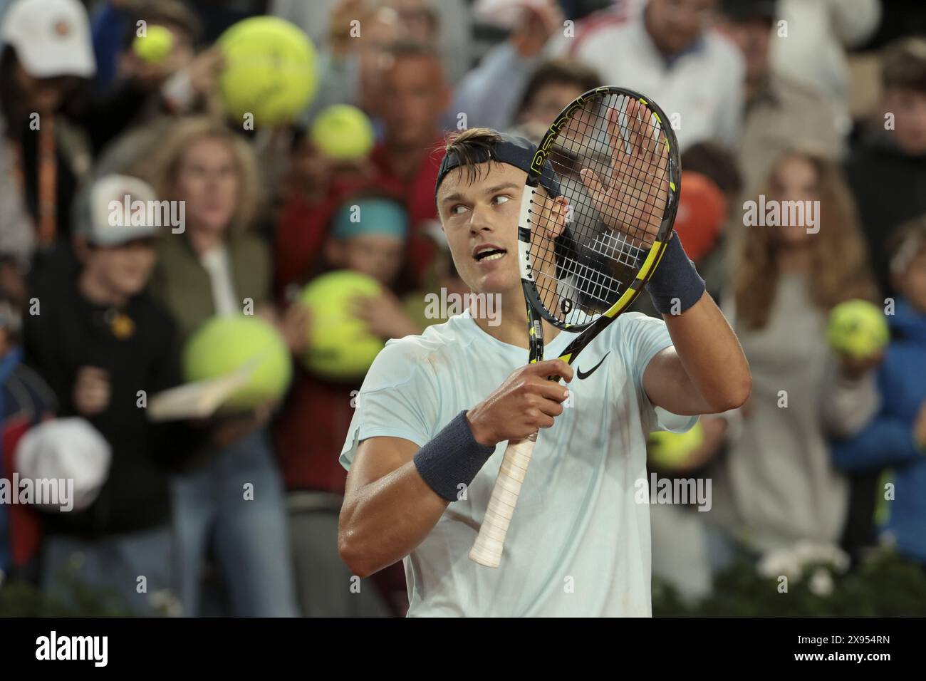 Holger Rune of Denmark celebrates his first round victory during day 3 ...