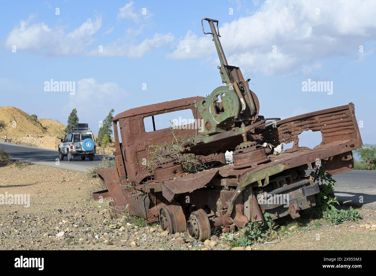 ETHIOPIA, Tigray, road to Mekelle, Tigray war 2020-2022 between forces allied to the Ethiopian federal government and Eritrea and the Tigray People's Liberation Front TPLF, destroyed russian artillery truck Ural - 4320 of eritrean troops and Un car of WFP world food program Stock Photo