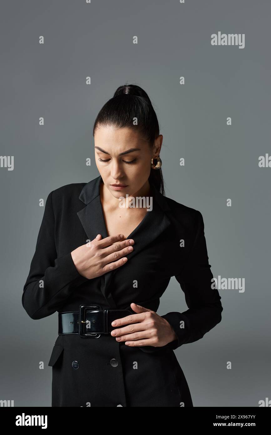 Professional woman in black suit hi-res stock photography and images ...