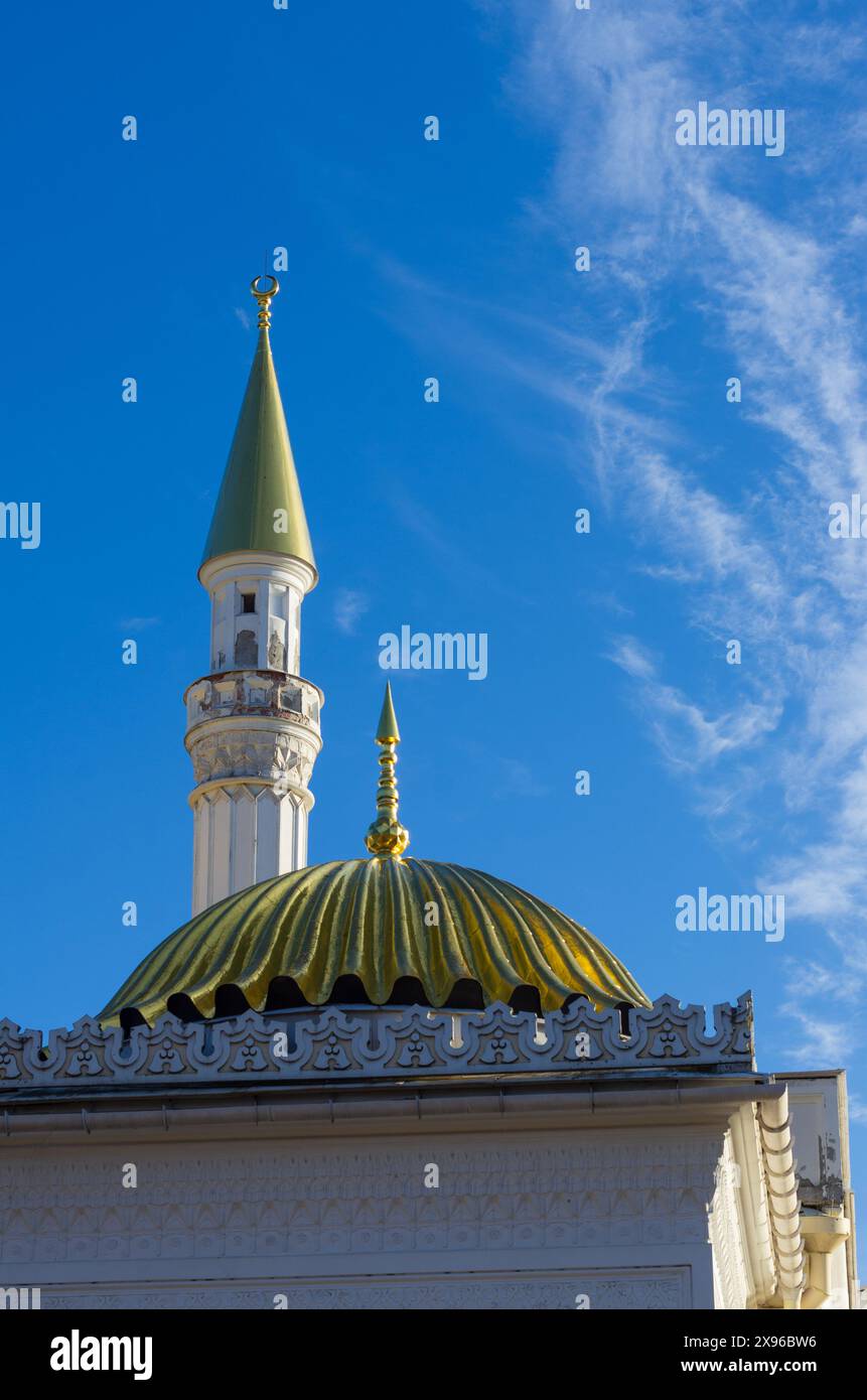 Minaret and gilded dome on the Turkish Bath building (St. Petersburg, Russia) Stock Photo