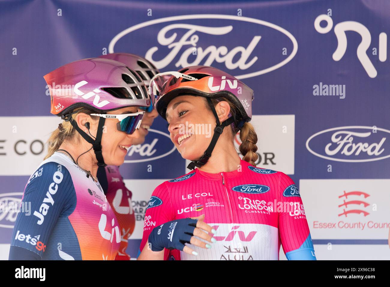 Riders of Liv Alula Jayco at 2024 Ford RideLondon Classique Women's WorldTour cycle race Stage 2, Maldon, Essex. Letizia Paternoster with Anna Trevisi Stock Photo