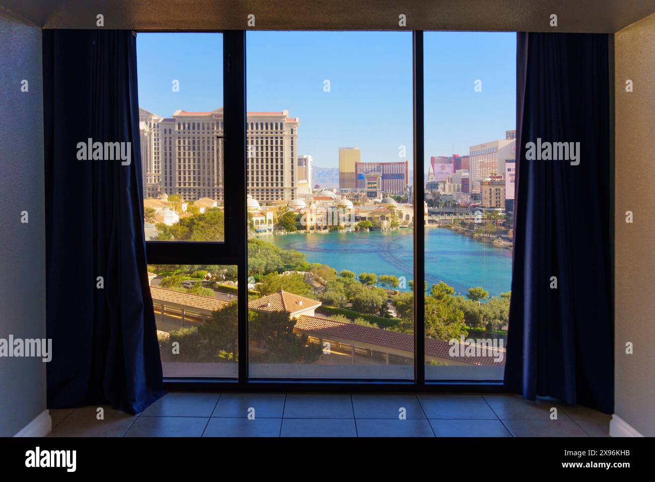 Las Vegas, Nevada - April 14, 2024: Hotel Room Overlooking Bellagio Fountains Lake Stock Photo