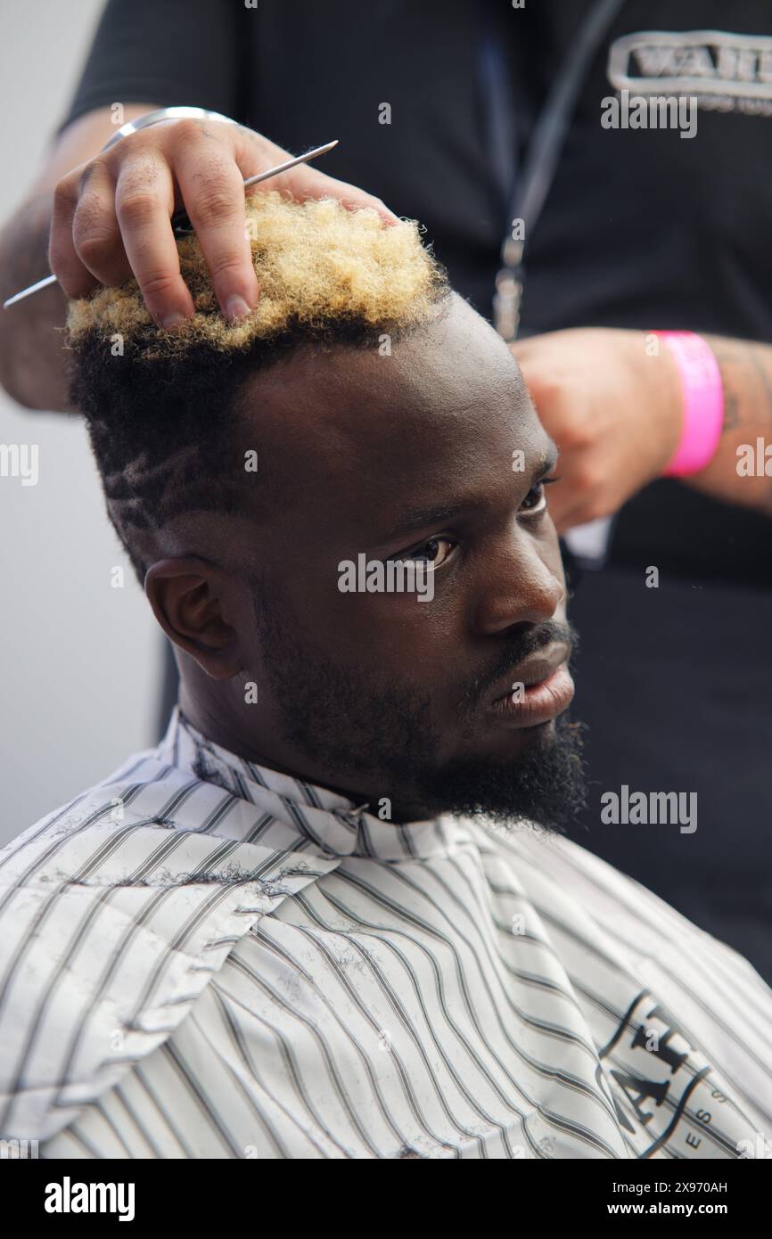 Afro Hair and Beauty Live 2024. Black hair and beauty show. Barbering competition. Fashion show. Stock Photo