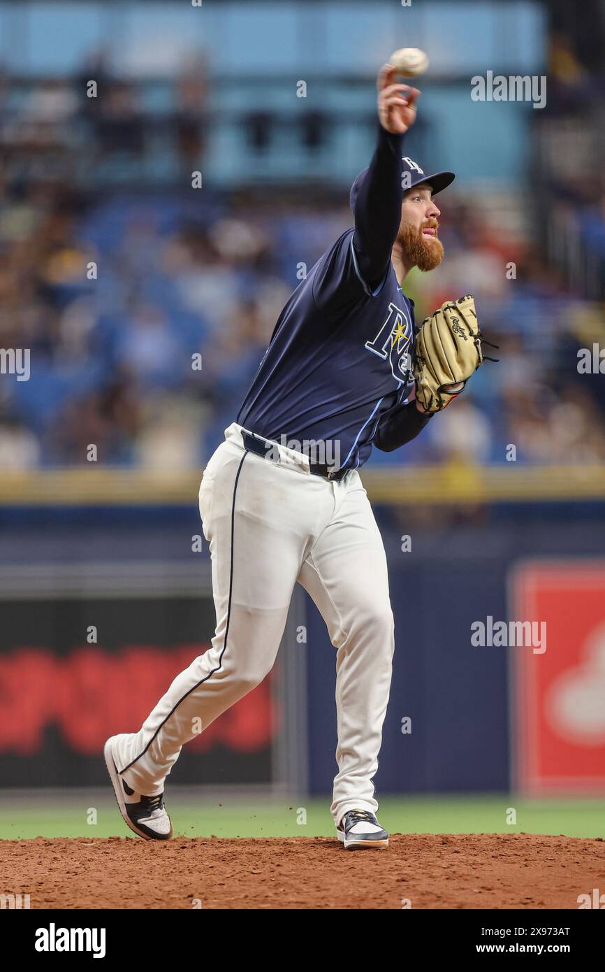 St. Petersburg, FL: Tampa Bay Rays pitcher Zack Littell (52) turns and throws to first baseman