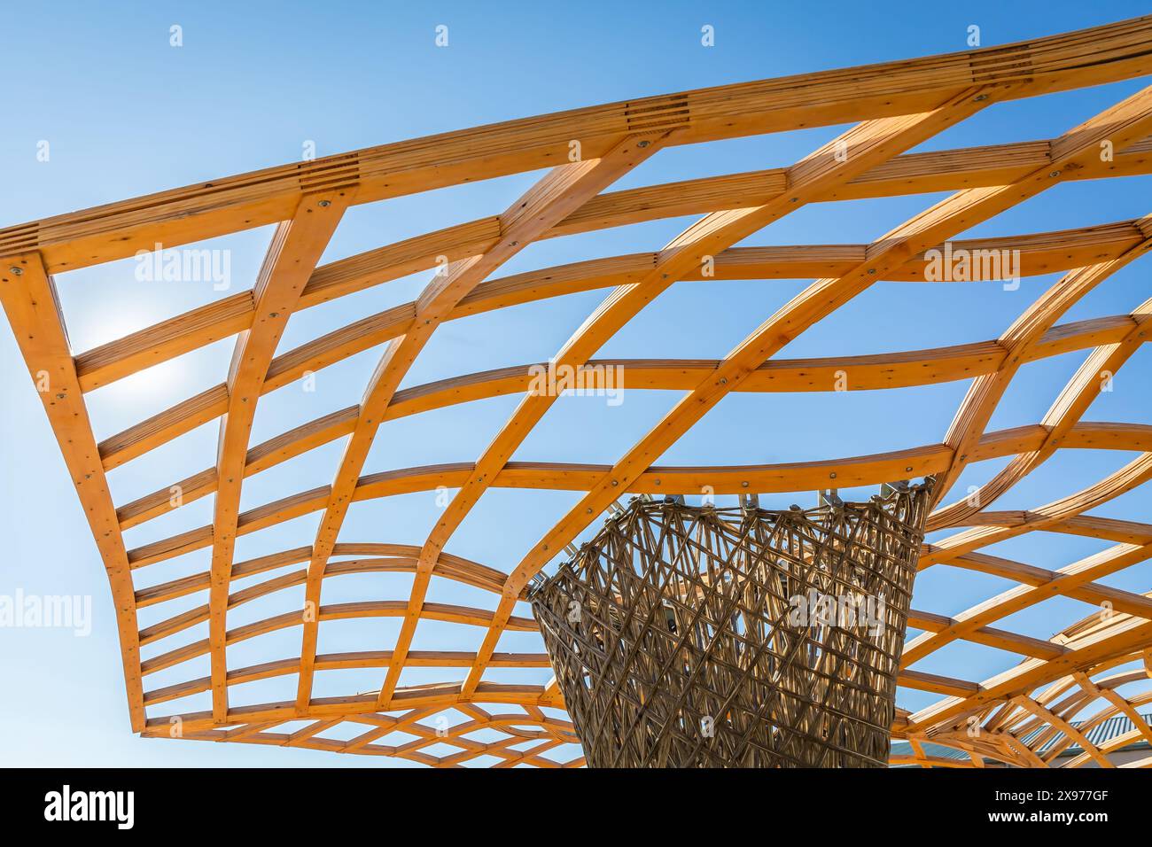 Detail of a modern wooden architecture, wooden roof, openwork design Stock Photo