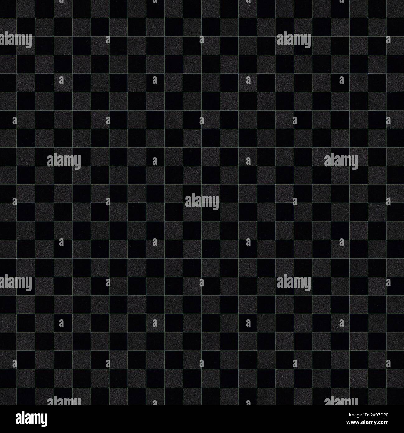 A pattern of small black squares arranged in a grid forming a dark checkerboard texture Stock Photo