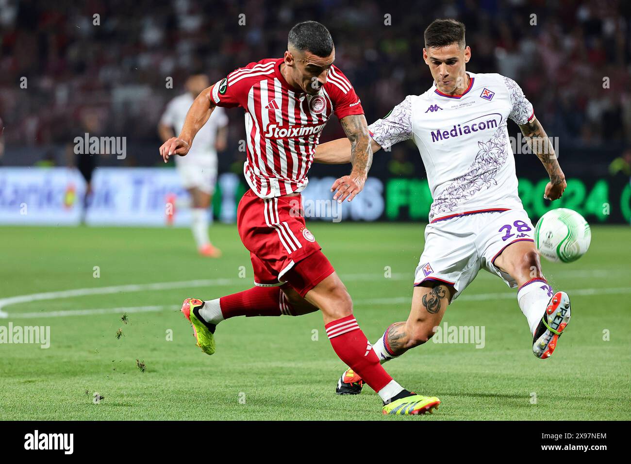 Athens, Greece. 29th May, 2024. Francisco Leonel Lima Silva Machado Chiquinho of Olympiacos FC and Lucas Martinez Quarta of ACF Fiorentina during the 2023/2024 Conference League Final football match between Olympiacos FC and ACF Fiorentina at AEK Arena stadium in Athens (Greece), May 29th, 2024. Credit: Insidefoto di andrea staccioli/Alamy Live News Stock Photo