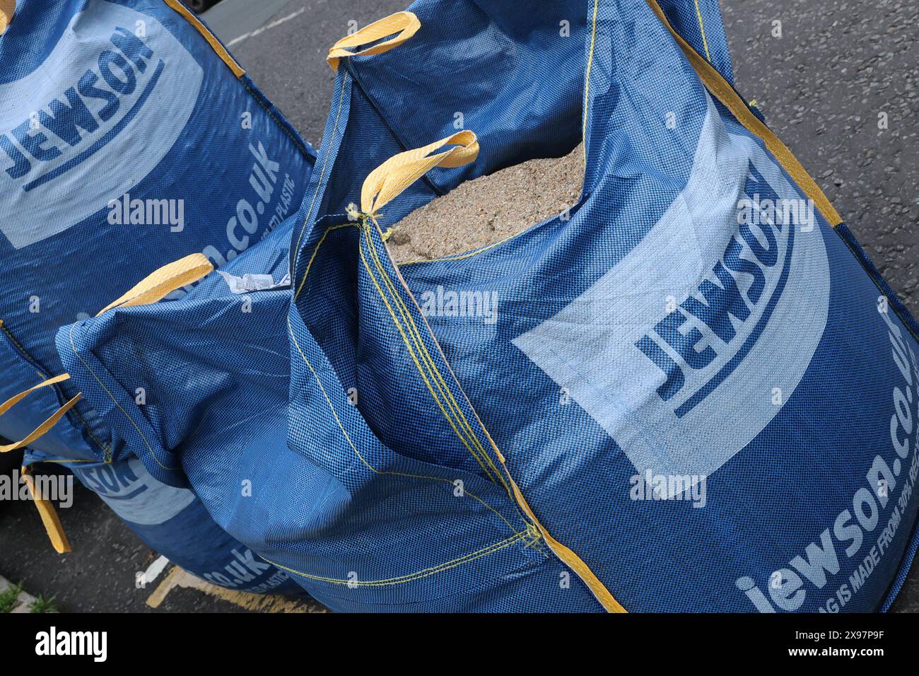 Sacks of ballast aggregate supplied by Jewson Stock Photo Alamy